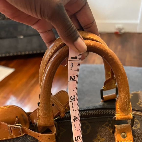 Louis Vuitton Duffle - Picture 9 of 12